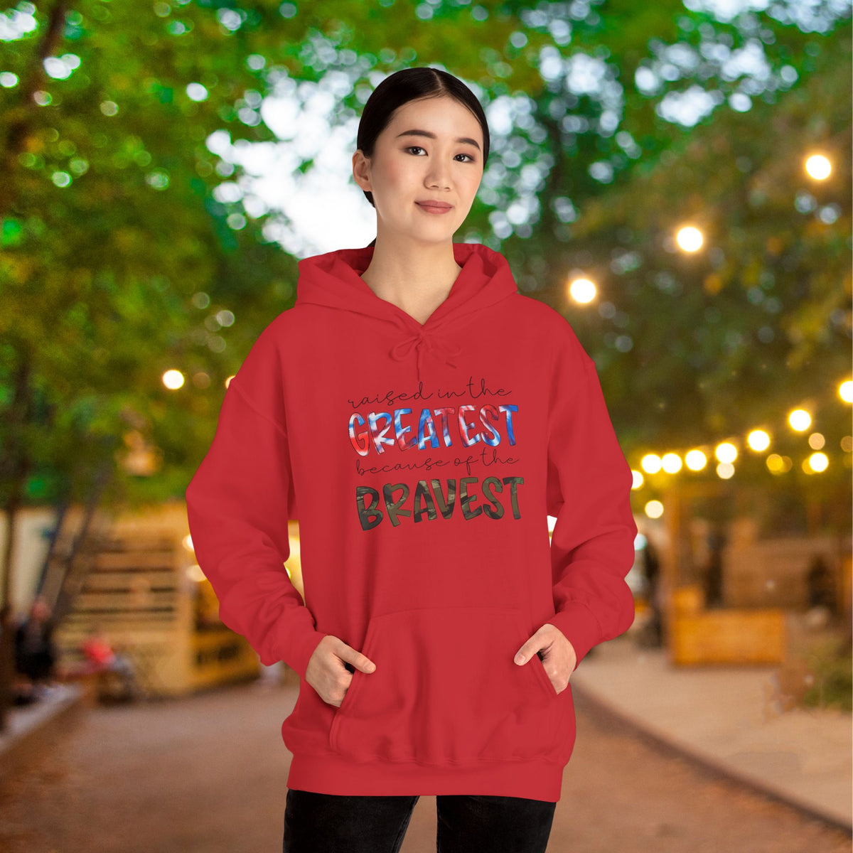 Raised In The Greatest Because Of The Bravest Adult Heavy Blend™ Hoodie