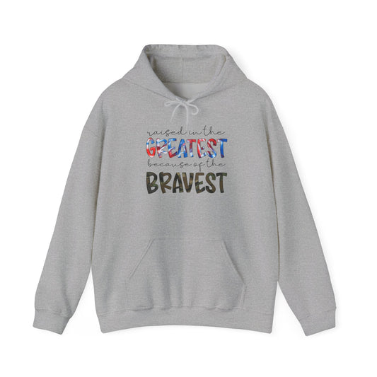 Raised In The Greatest Because Of The Bravest Heavy Blend™ Hooded Sweatshirt