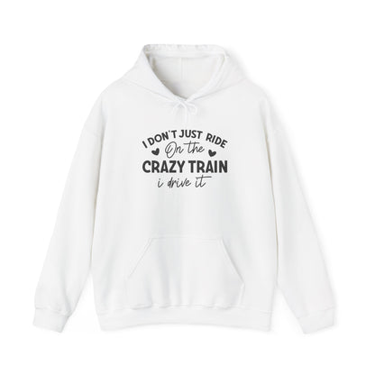 I Don't Just Ride On The Crazy Train, I Drive It Heavy Blend™ Hooded Sweatshirt