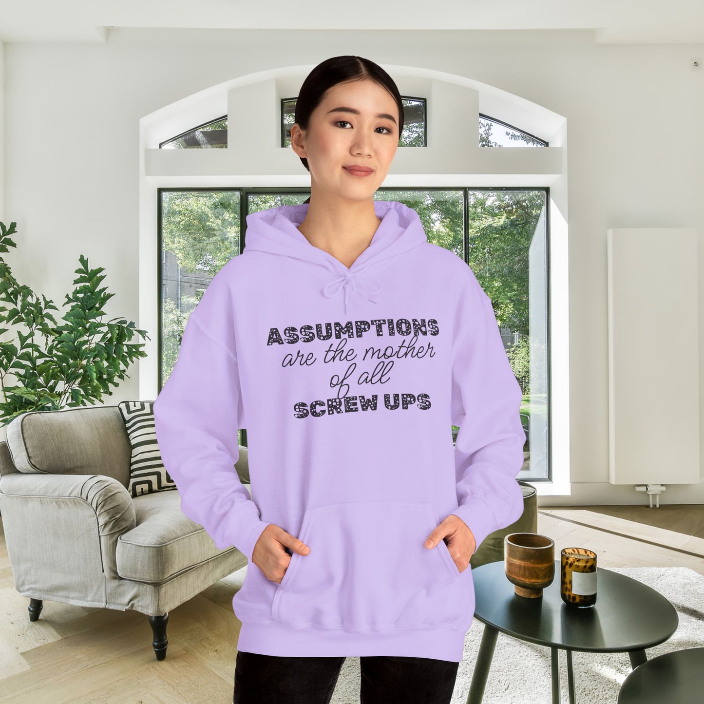 Assumptions are the Mother of All Screwups Heavy Blend™ Hooded Sweatshirt