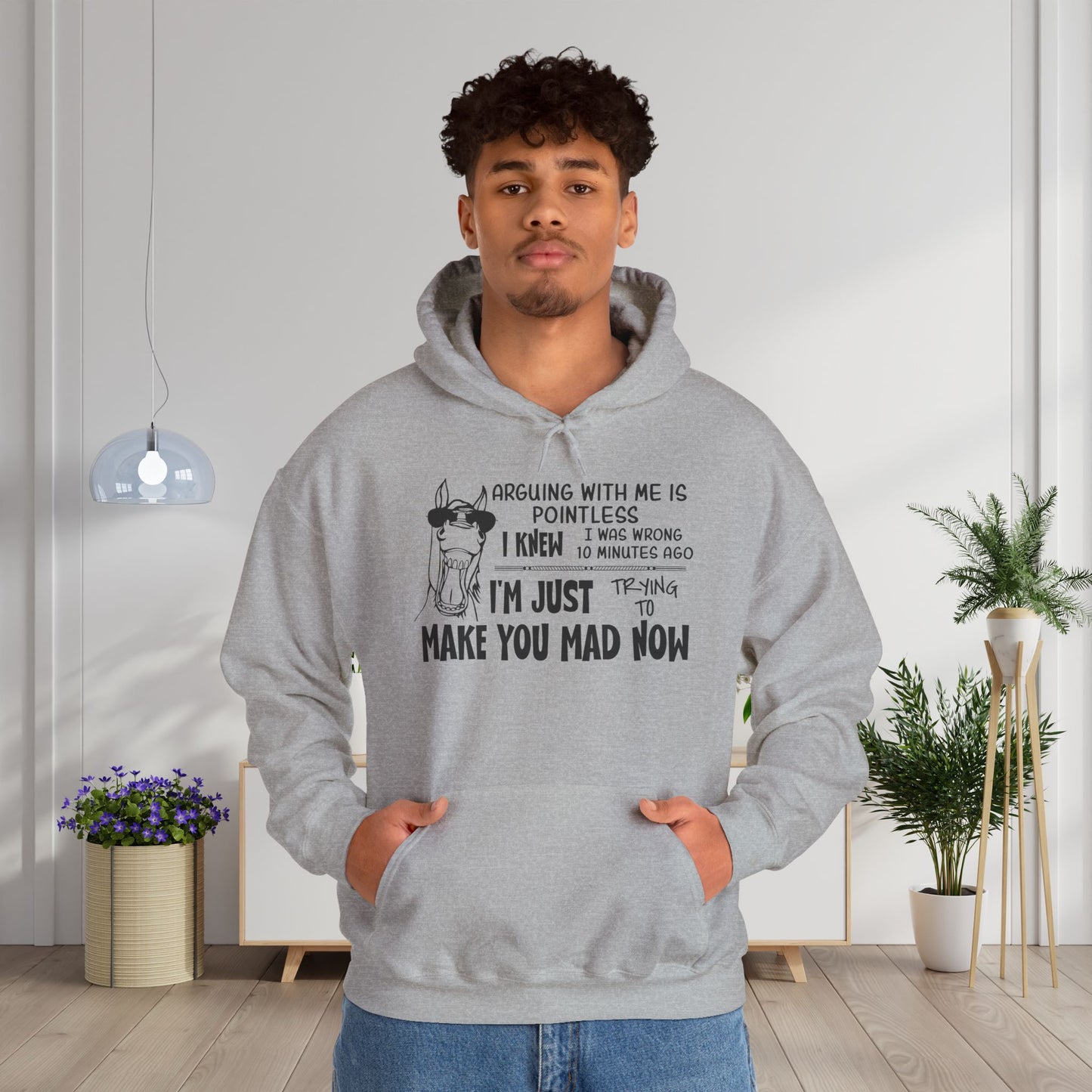 Arguing With Me is Pointless... Heavy Blend™ Hooded Sweatshirt