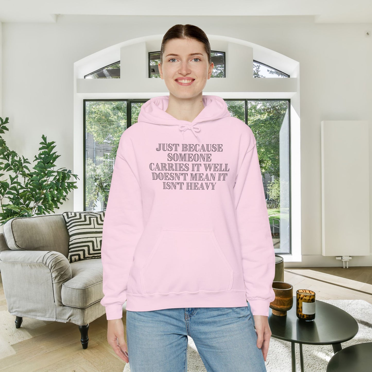 Just Because Someone Carries It Well Doesn't Mean It Isn't Heavy Heavy Blend™ Hooded Sweatshirt