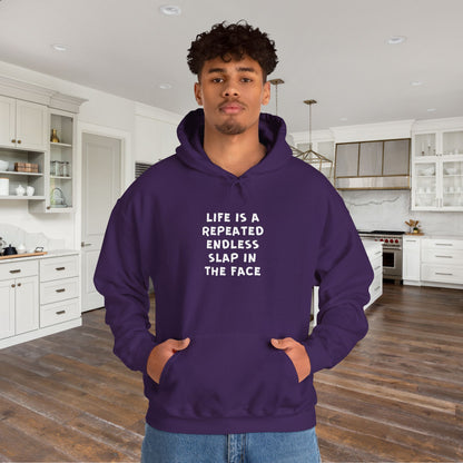 Life Is A Repeated Endless Slap In The Face Heavy Blend™ Hooded Sweatshirt