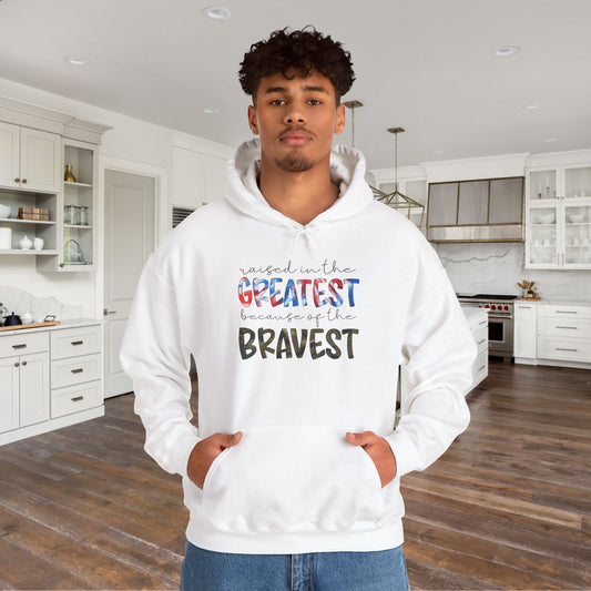 Raised In The Greatest Because Of The Bravest Heavy Blend™ Hooded Sweatshirt