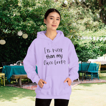 I'm Nicer Than My Face Looks Heavy Blend™ Hooded Sweatshirt