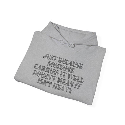 Just Because Someone Carries It Well Doesn't Mean It Isn't Heavy Heavy Blend™ Hooded Sweatshirt