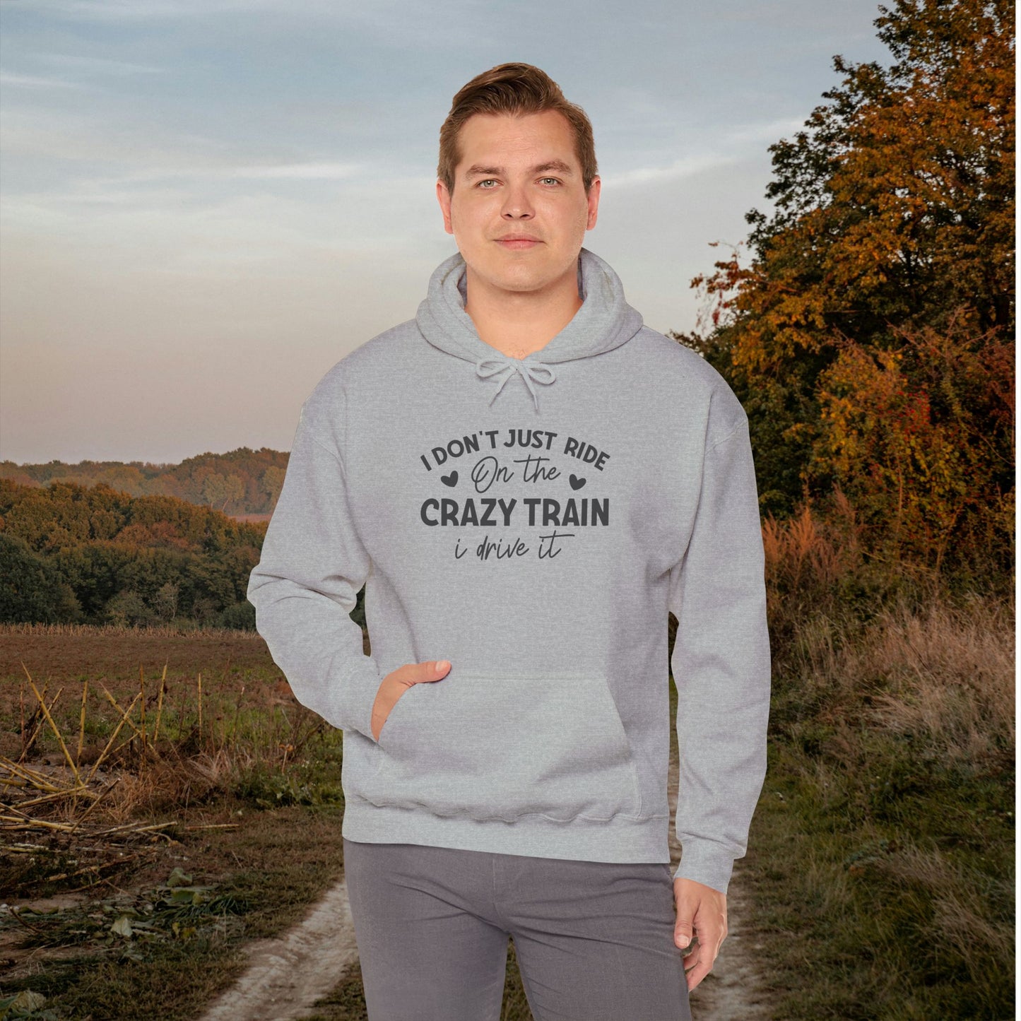 I Don't Just Ride On The Crazy Train, I Drive It Heavy Blend™ Hooded Sweatshirt