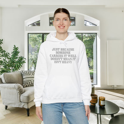 Just Because Someone Carries It Well Doesn't Mean It's Heavy Heavy Blend™ Hooded Sweatshirt