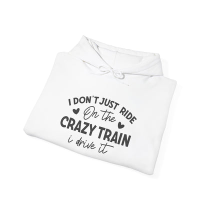 I Don't Just Ride On The Crazy Train, I Drive It Heavy Blend™ Hooded Sweatshirt