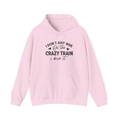 I Don't Just Ride On The Crazy Train, I Drive It Heavy Blend™ Hooded Sweatshirt