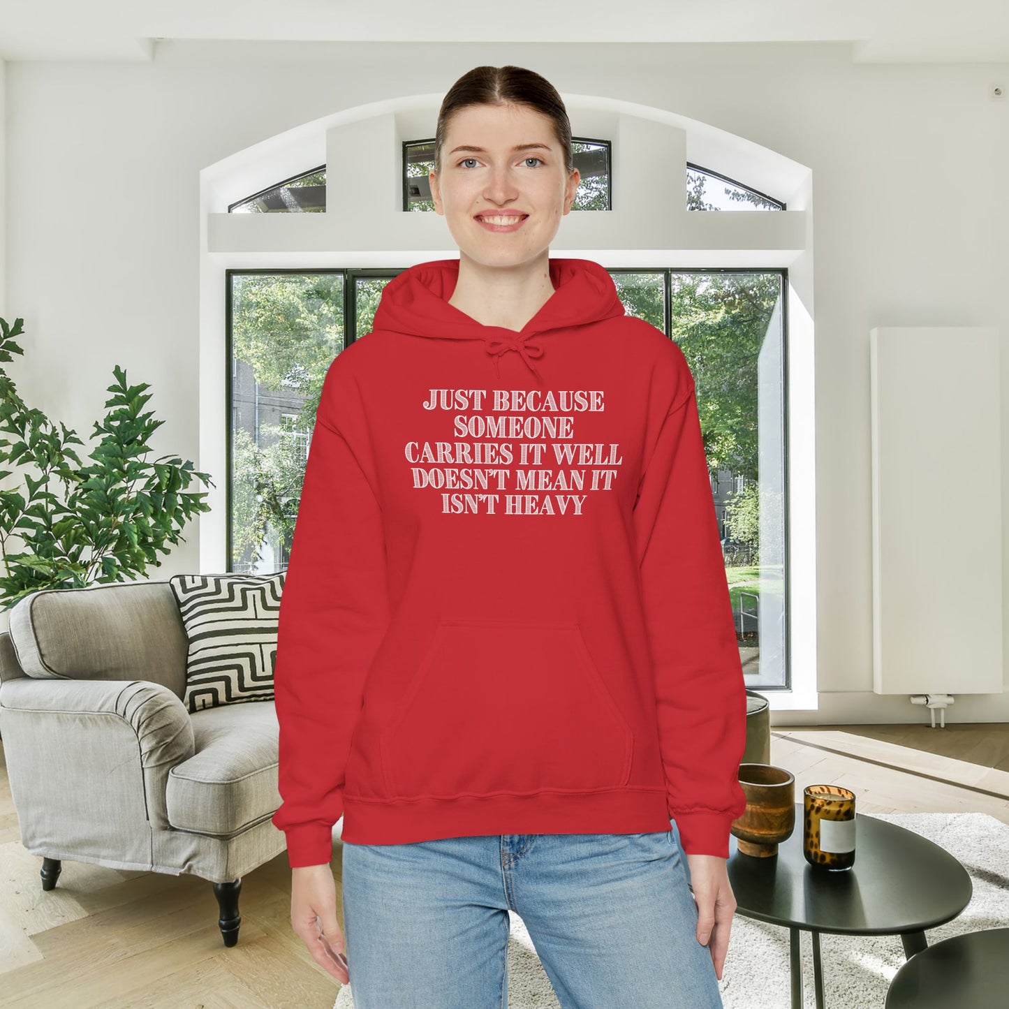 Just Because Someone Carries It Well Doesn't Mean It Isn't Heavy Heavy Blend™ Hooded Sweatshirt