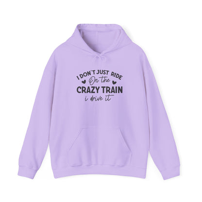 I Don't Just Ride On The Crazy Train, I Drive It Heavy Blend™ Hooded Sweatshirt