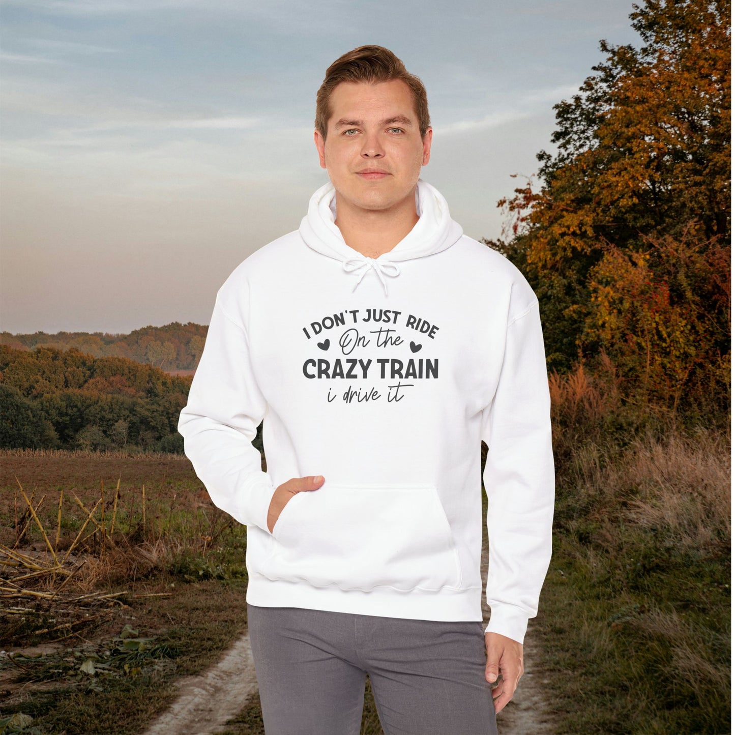 I Don't Just Ride On The Crazy Train, I Drive It Heavy Blend™ Hooded Sweatshirt