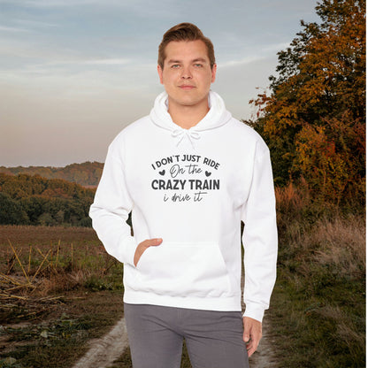 I Don't Just Ride On The Crazy Train, I Drive It Heavy Blend™ Hooded Sweatshirt
