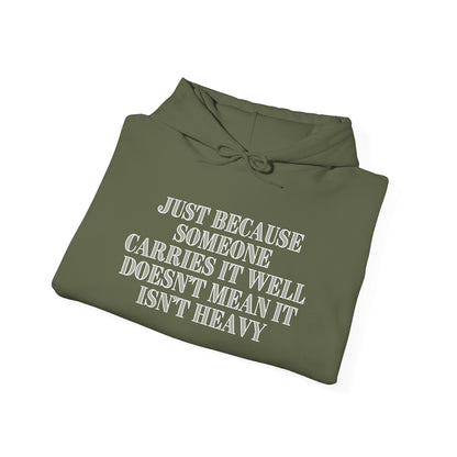 Just Because Someone Carries It Well Doesn't Mean It's Heavy Heavy Blend™ Hooded Sweatshirt