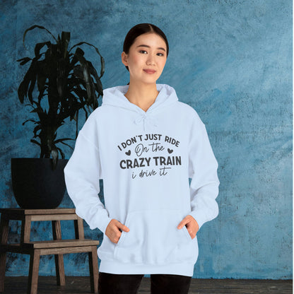 I Don't Just Ride On The Crazy Train, I Drive It Heavy Blend™ Hooded Sweatshirt