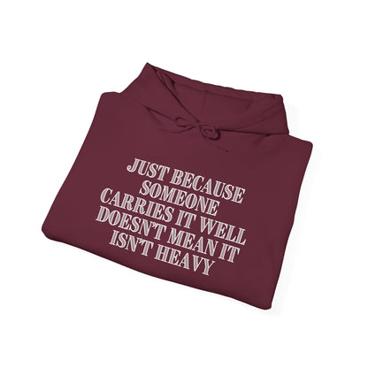 Just Because Someone Carries It Well Doesn't Mean It's Heavy Heavy Blend™ Hooded Sweatshirt