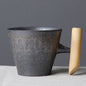 Unusual Ceramic Mug with Wooden Handle