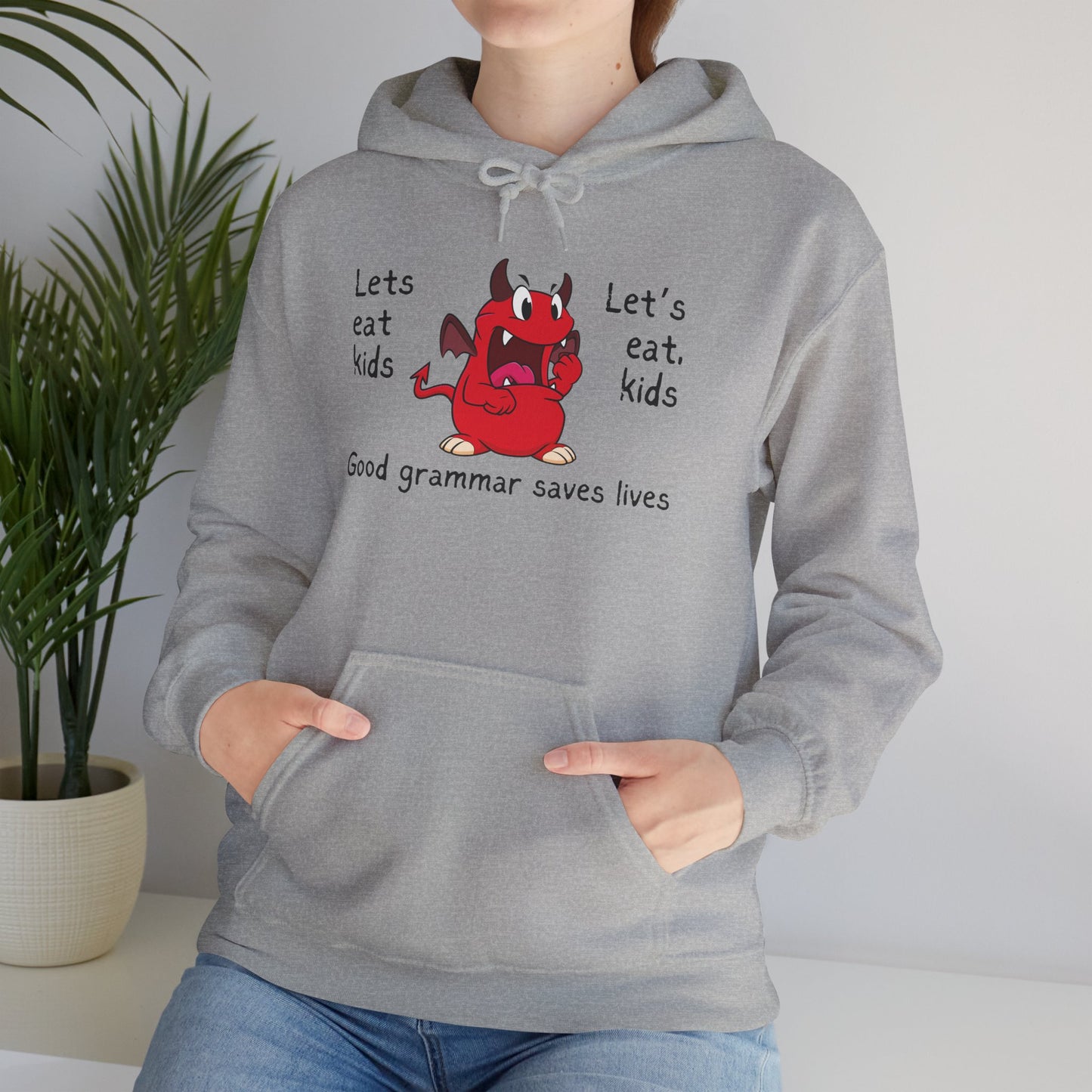 Let's Eat Kids Grammar Saves Lives Heavy Blend™ Hooded Sweatshirt