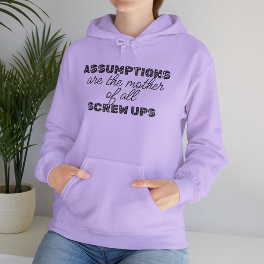 Assumptions are the Mother of All Screwups Heavy Blend™ Hooded Sweatshirt