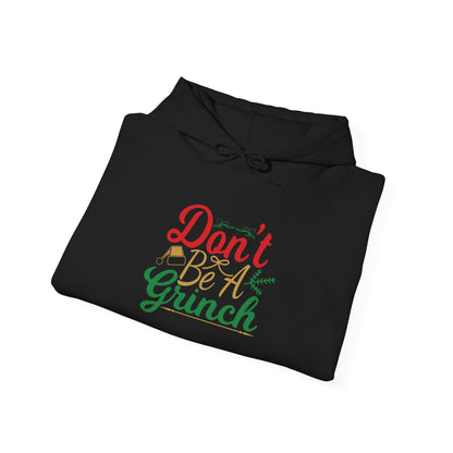 Don't Be A Grinch Adult Heavy Blend™ Hooded Sweatshirt