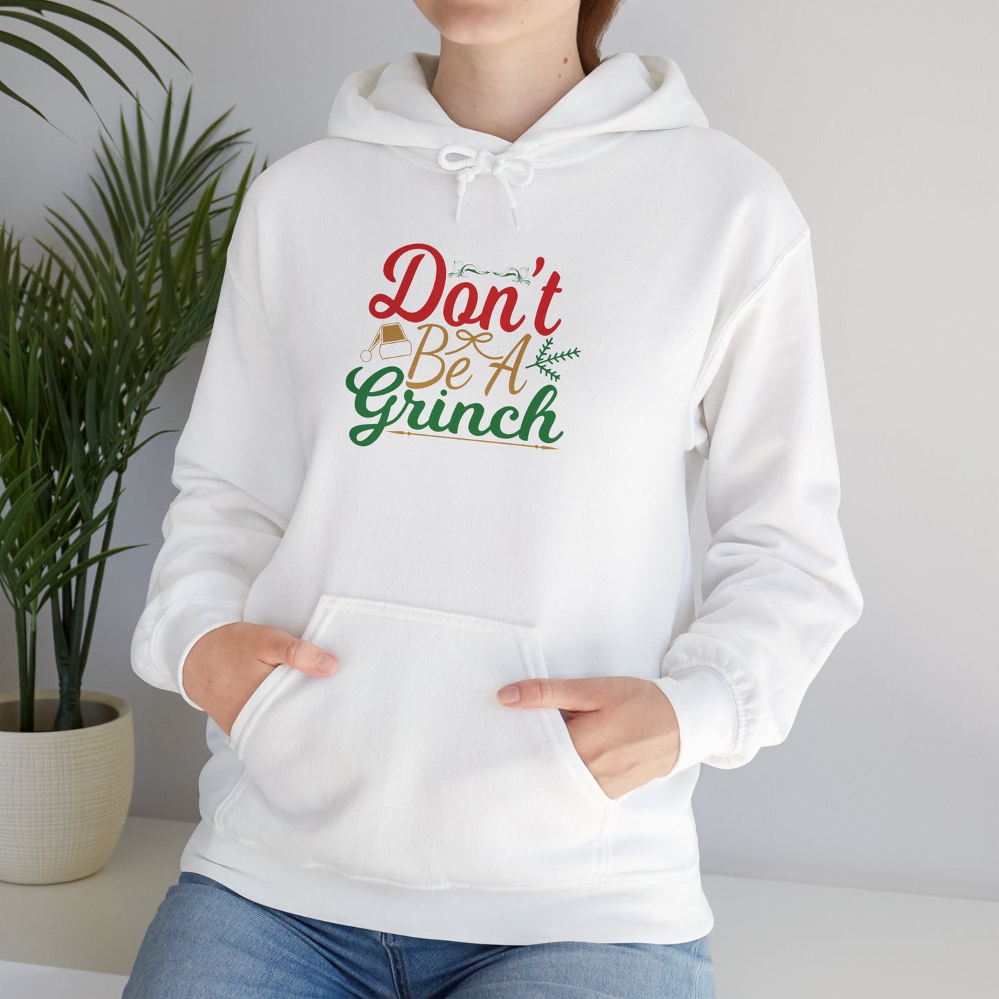 Don't Be A Grinch Adult Heavy Blend™ Hooded Sweatshirt