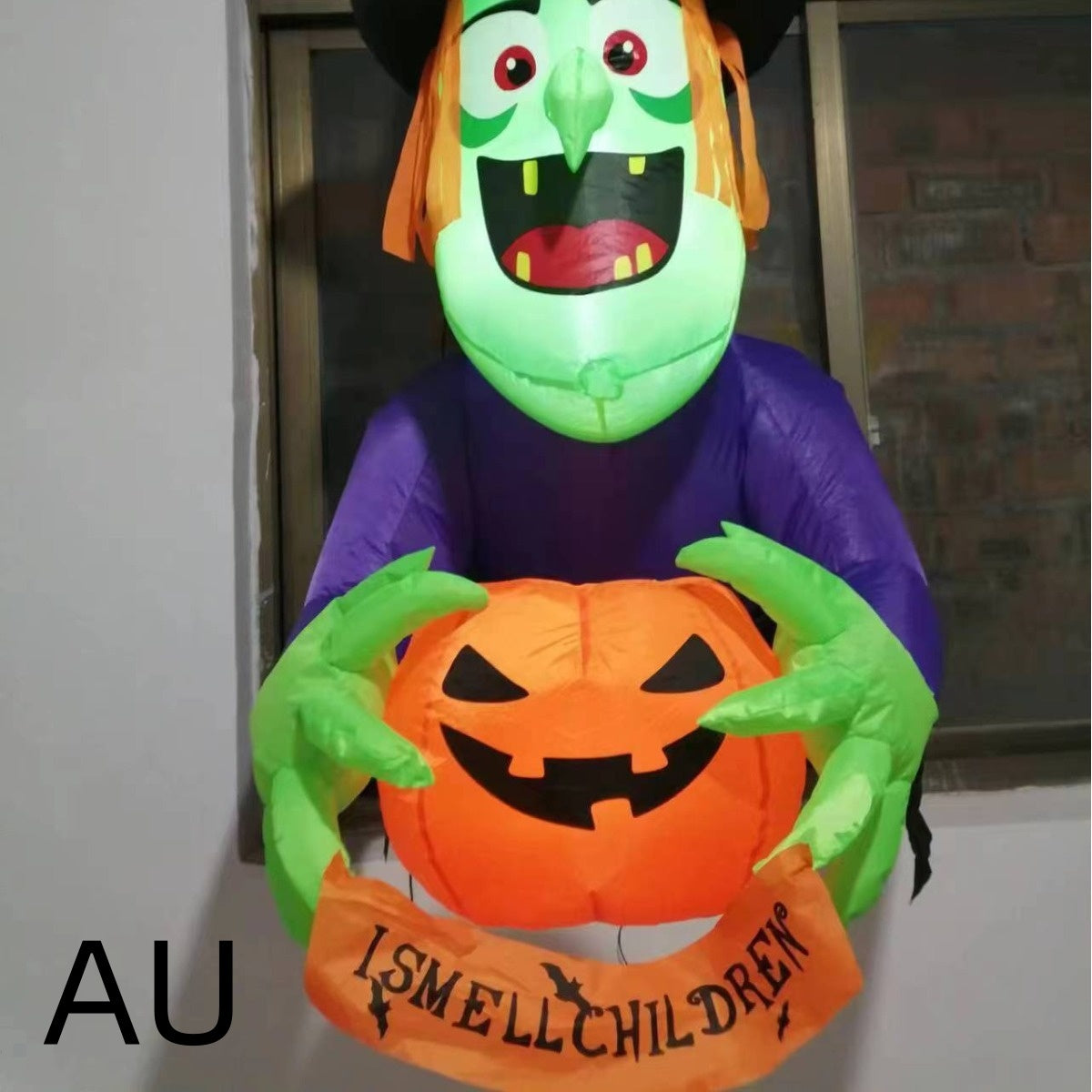 Inflatable Window Witch Holding a Pumpkin Decor